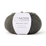 A ball of Rowan mode Merino Soft yarn in colour charcoal