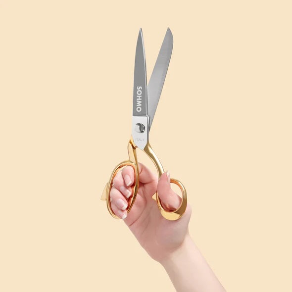 Hand holding SOHMO 10" Tailoring Shears