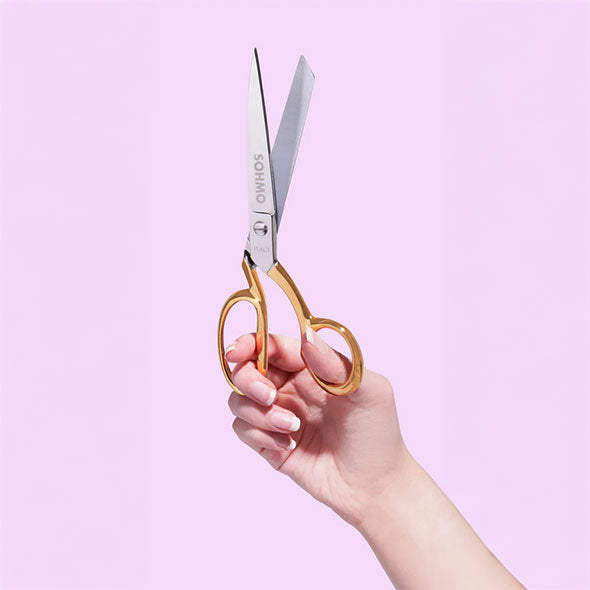 Hand holding SOHMO 8" Tailoring Shears