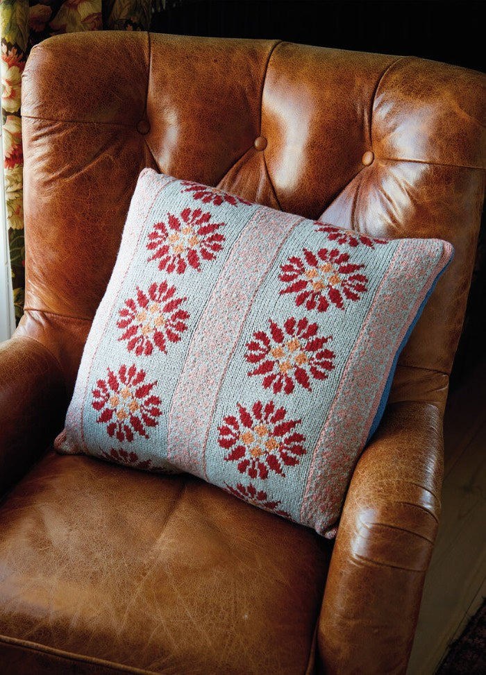 Torfinn cushion featuring a bold Nordic floral front and coordinating geometric back, or pair with a plain back; Softyak DK.