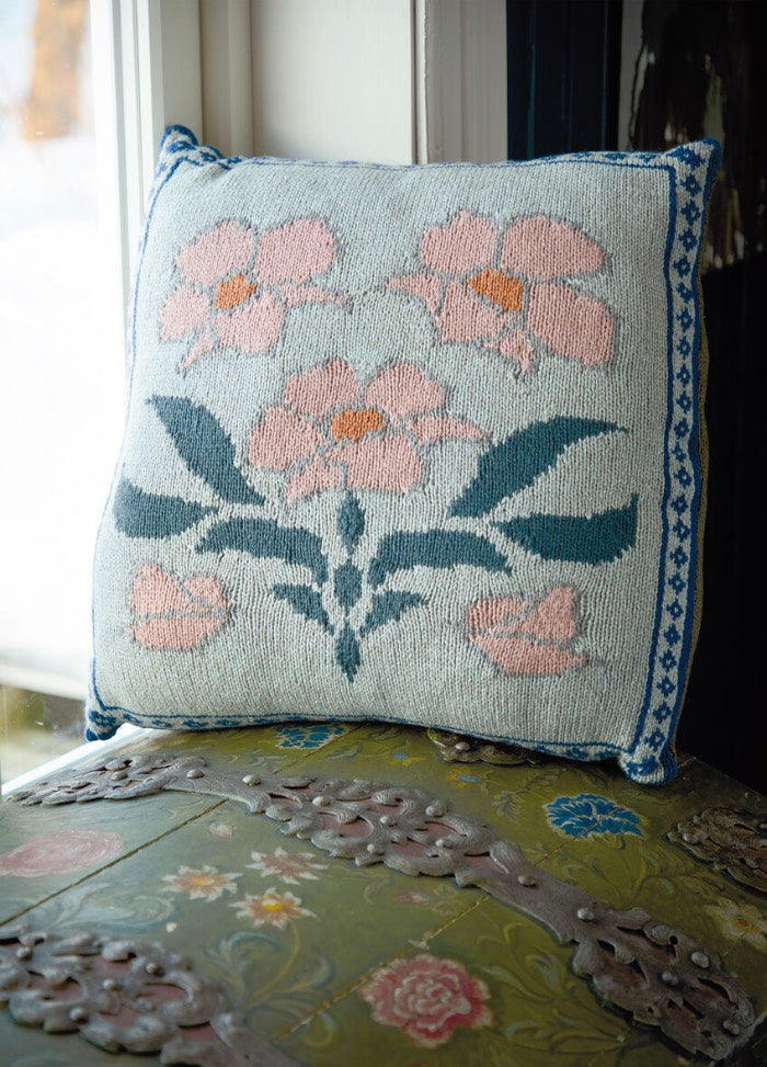 Vildis cushion showcasing traditional Scandinavian motifs; knit one side or both for a unique home accessory; Softyak DK.