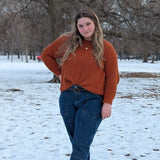 lady wearing the duna sweater in winter