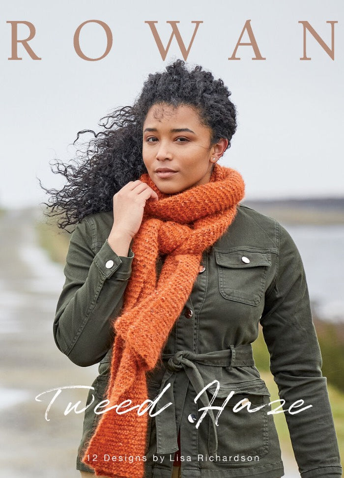 A woman stands outdoors, wearing an olive jacket and an orange knitted scarf. "Rowan" and "Tweed Haze" are text on the image, conveying elegance and warmth.