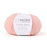 a ball of rowan_mode_alpaca_wool yarn in colour salmon quartz